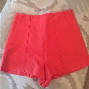 High waisted red/coral shorts