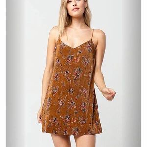 Full tilt floral accordion pleat dress