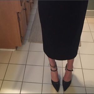 Black pointed high heels
