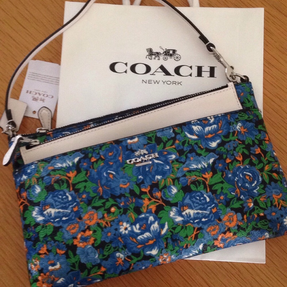 Coach floral 2 piece wristlet set