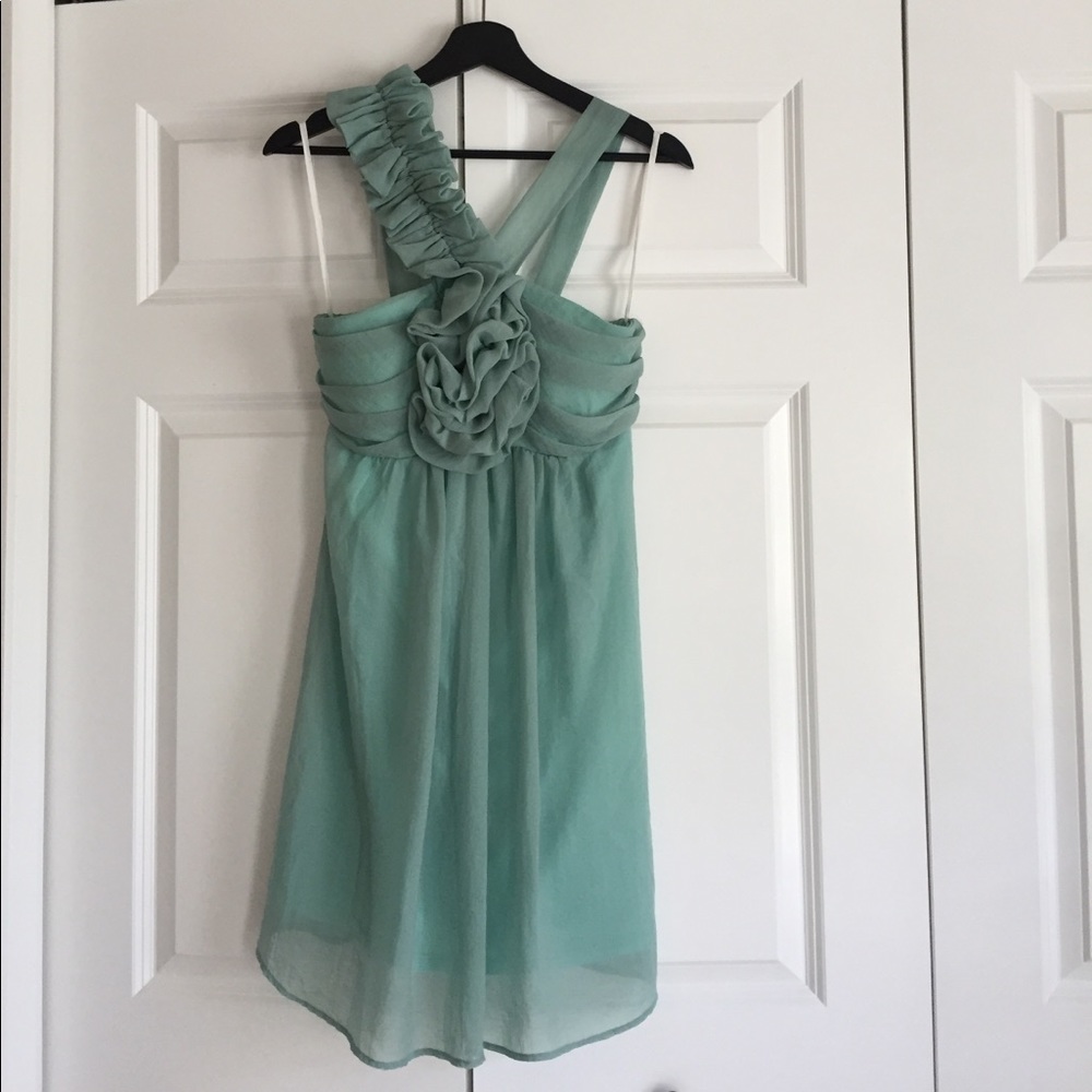 Knee length dress with ruffles.
