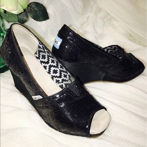 Black wedge sequin TOMS in Great condition.
