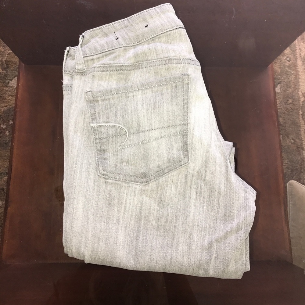 Grey light washed skinny jeans