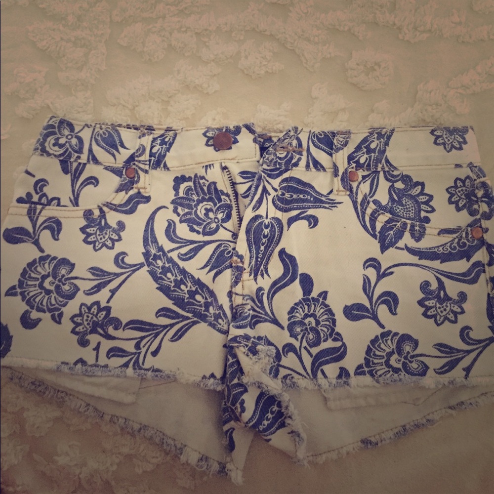 Blue and white floral denim shorts
