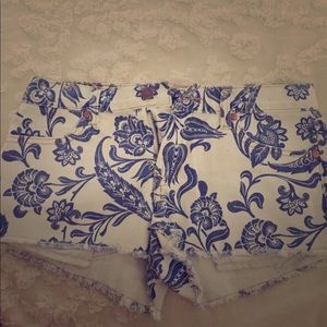 Blue and white floral denim shorts