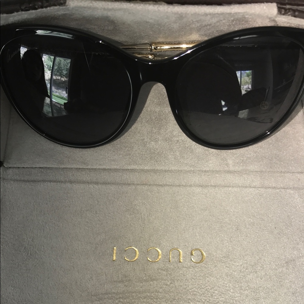 Gucci sunglasses.