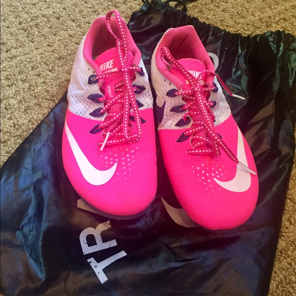 Nike pink track spikes.
