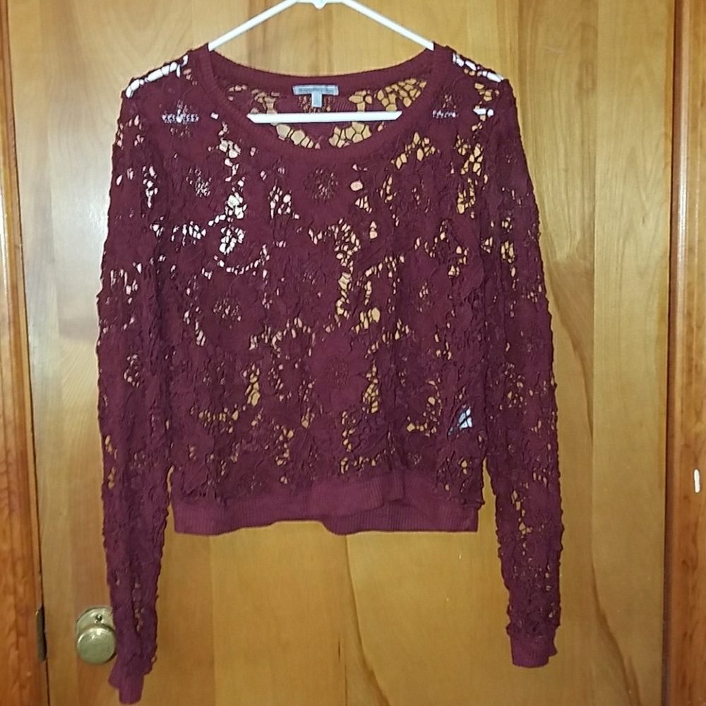 Maroon knit sweater.