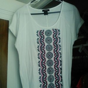 White top with black tribal print