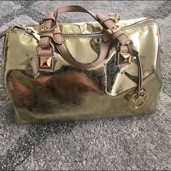 Michael Kors Handbags - 🎉 Michael Kors Grayson Gold Monogram🎉
