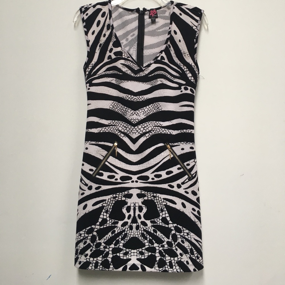 BEBE black and white animal print mini dress