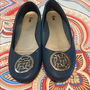 Teal shoes with a cute accent!