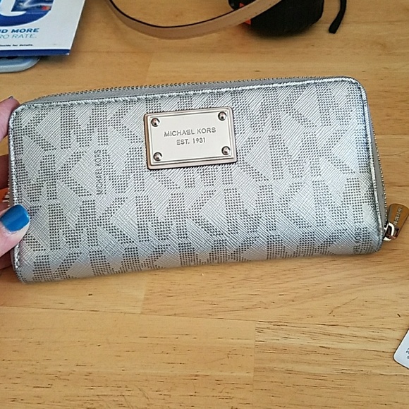 Michael Kors Handbags - Michael Kors Silver Wallet