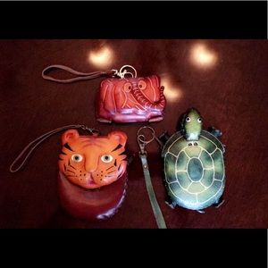 3 mini leather wrist wallets.