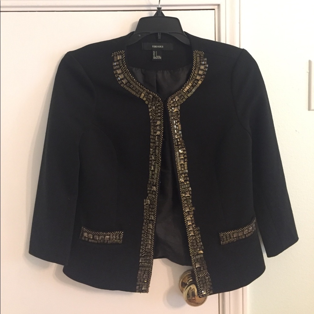 Black blazer with gold beading.