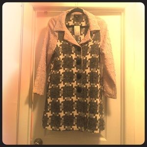 Grey, cream, white, and black coat.