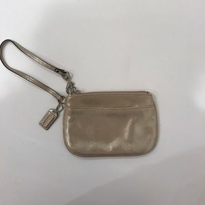Coach sparkly beige/gold wristlet!