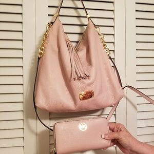Light pink Michael Kors matching purse and wallet.