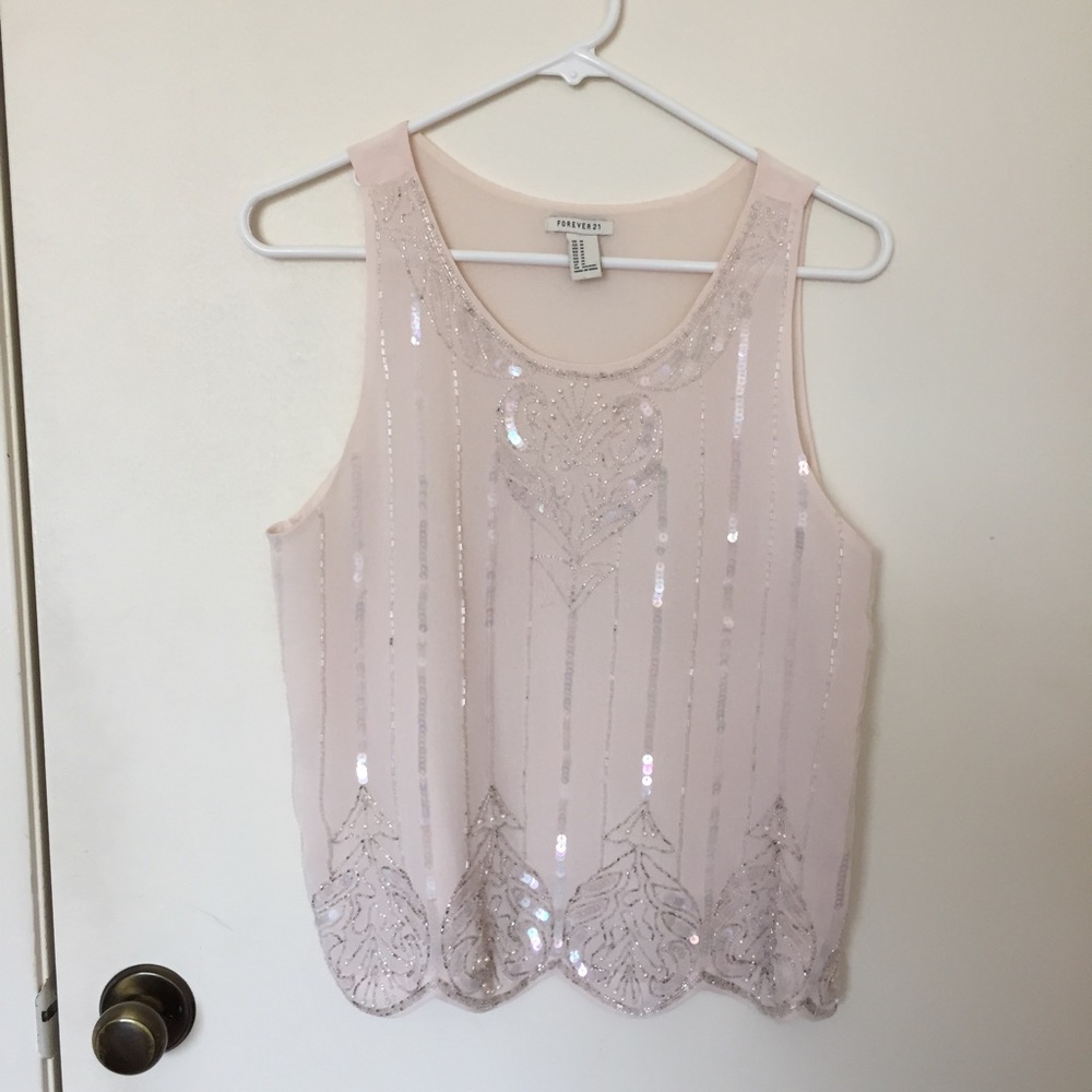 Sleeveless blouse with delicate embroidery