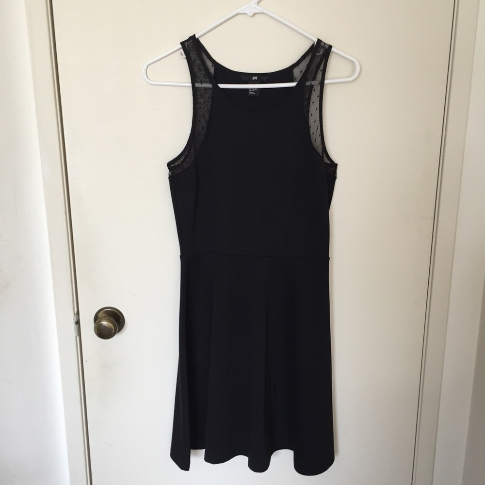 Black sleeveless dress with mesh detailing
