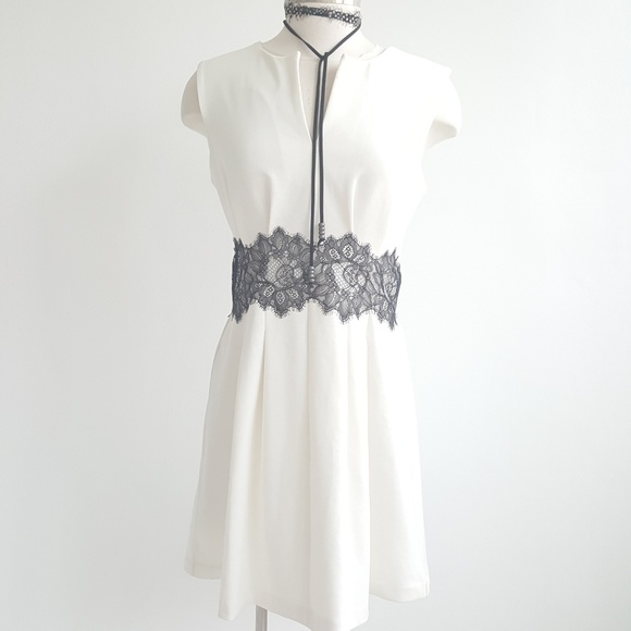 BCBGeneration Dresses & Skirts - BCBGeneration Ivory Sleevless Dress