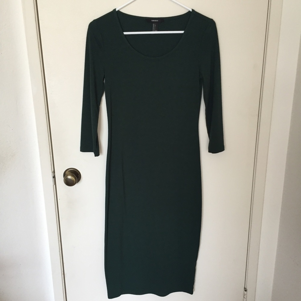Forest green long sleeved body con dress