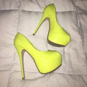 Neon yellow pumps