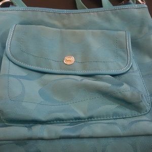 Well loved blue Coach bag