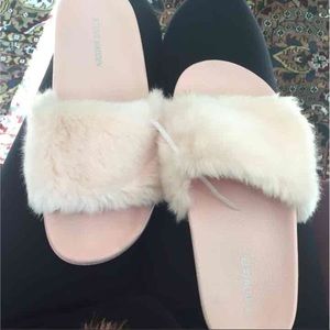 Steve Madden pink fuzzy slippers