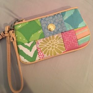 Patchwork multi-patterned Coach wristlet
