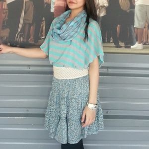 poncho style top in blue and grey