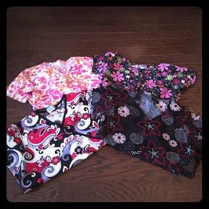 Scrub tops. Peaches and HQ are the brands.