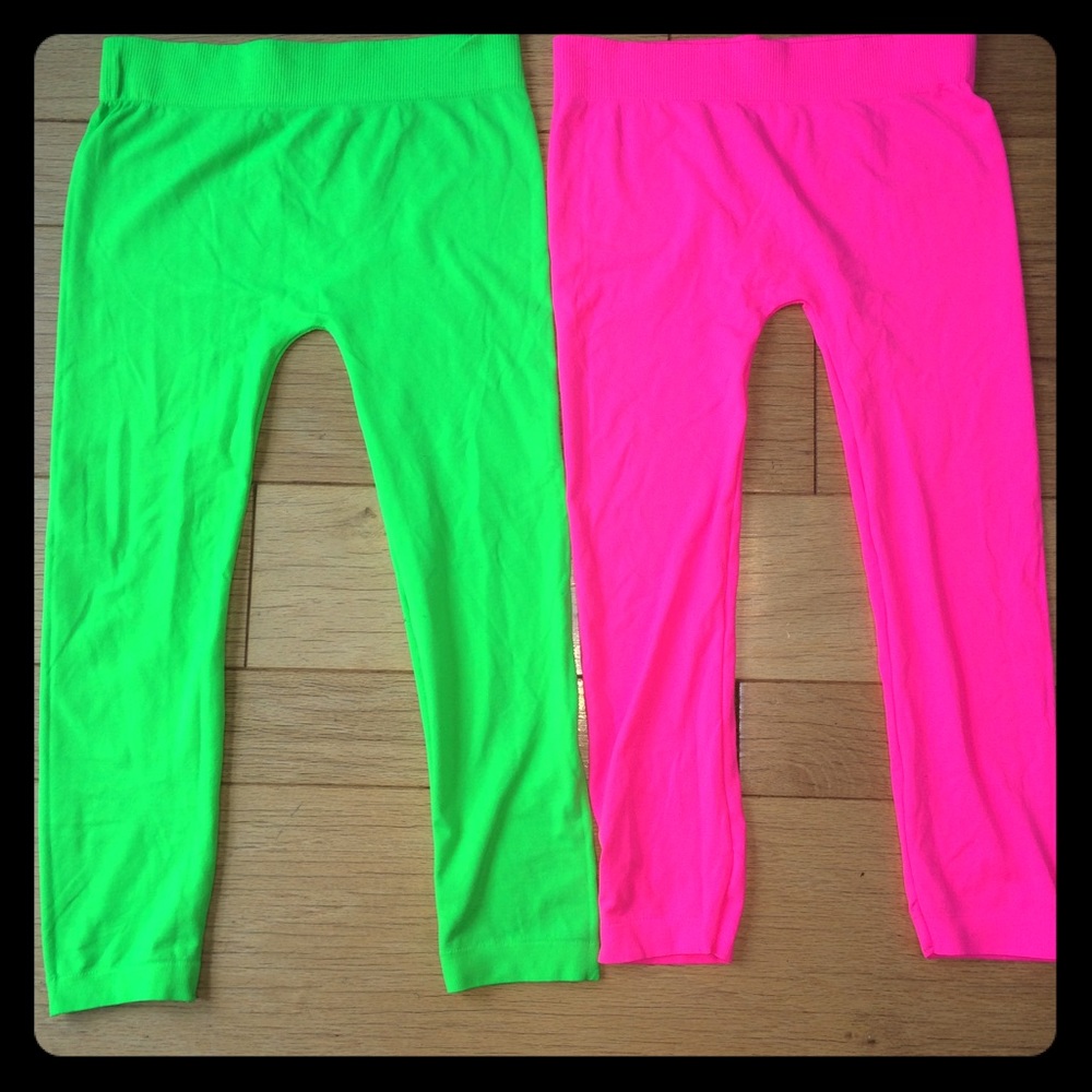 Bundle of bright pink and green tights