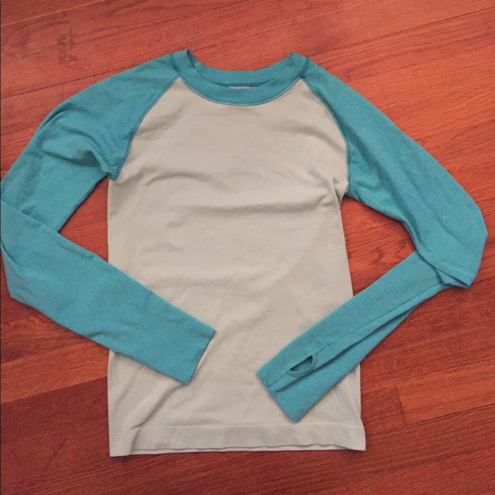 Turquoise long sleeve tech top with thumb holes