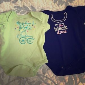 Set of baby girl onesies