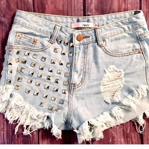 Frayed and studded jean shorts