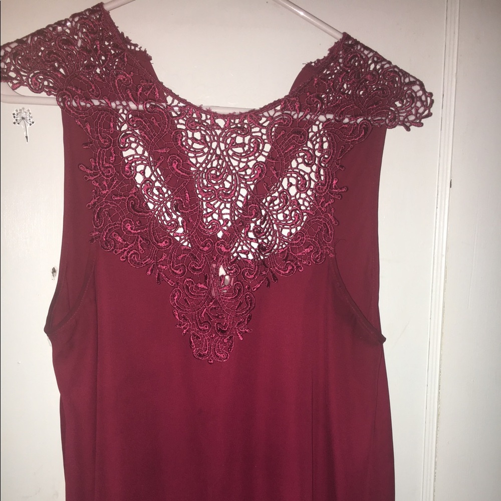 Red shirt with floral cutout design at top