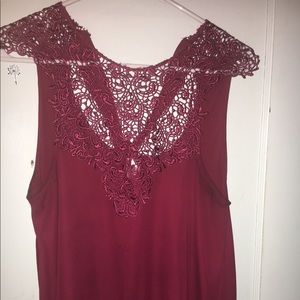 Red shirt with floral cutout design at top