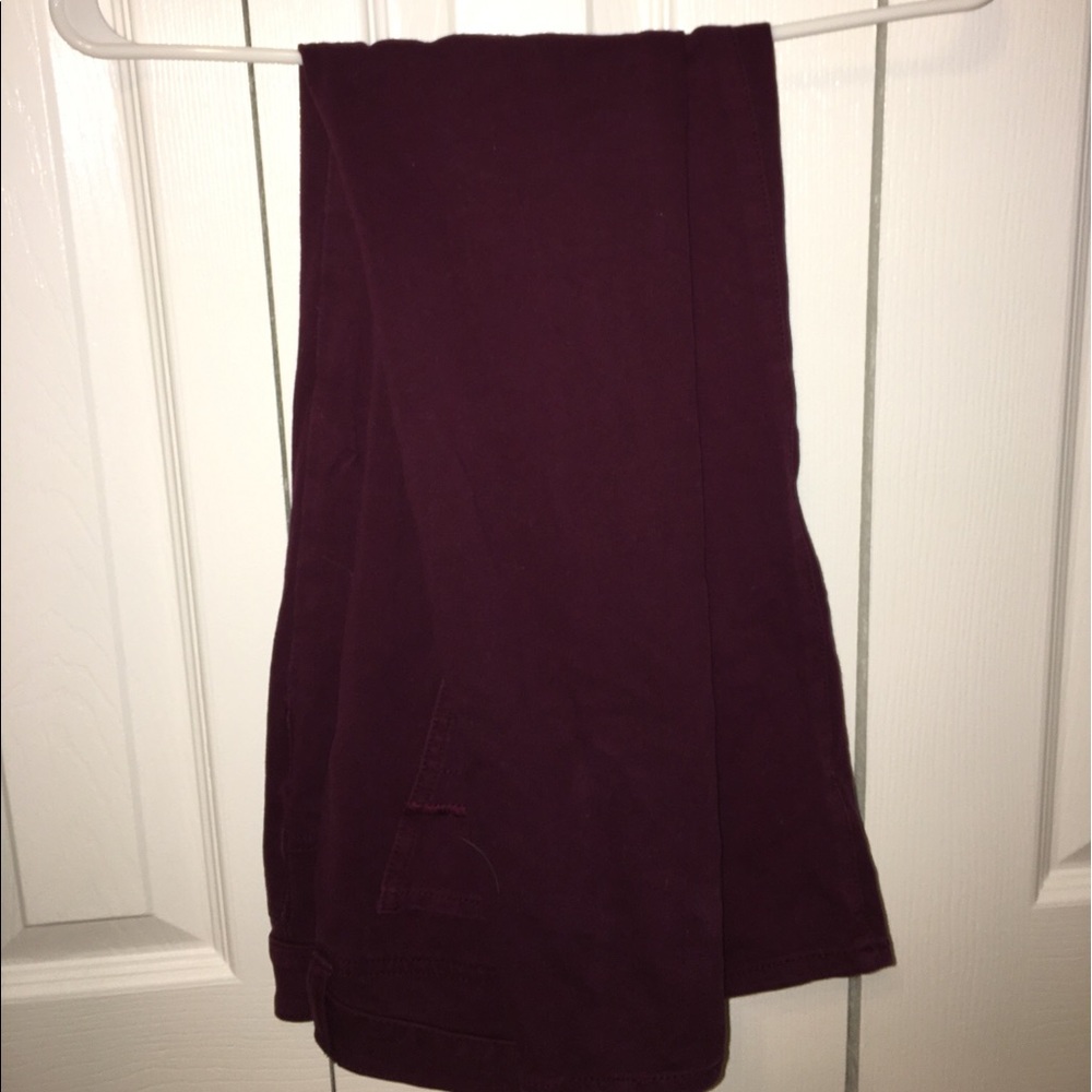 Burgundy jeans.