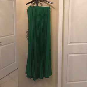 Green pleated long maxi skirt