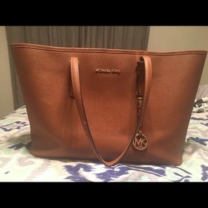 Brown Michael Kors laptop bag