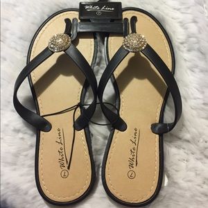 White Line rhinestone medallion sandals flip flops