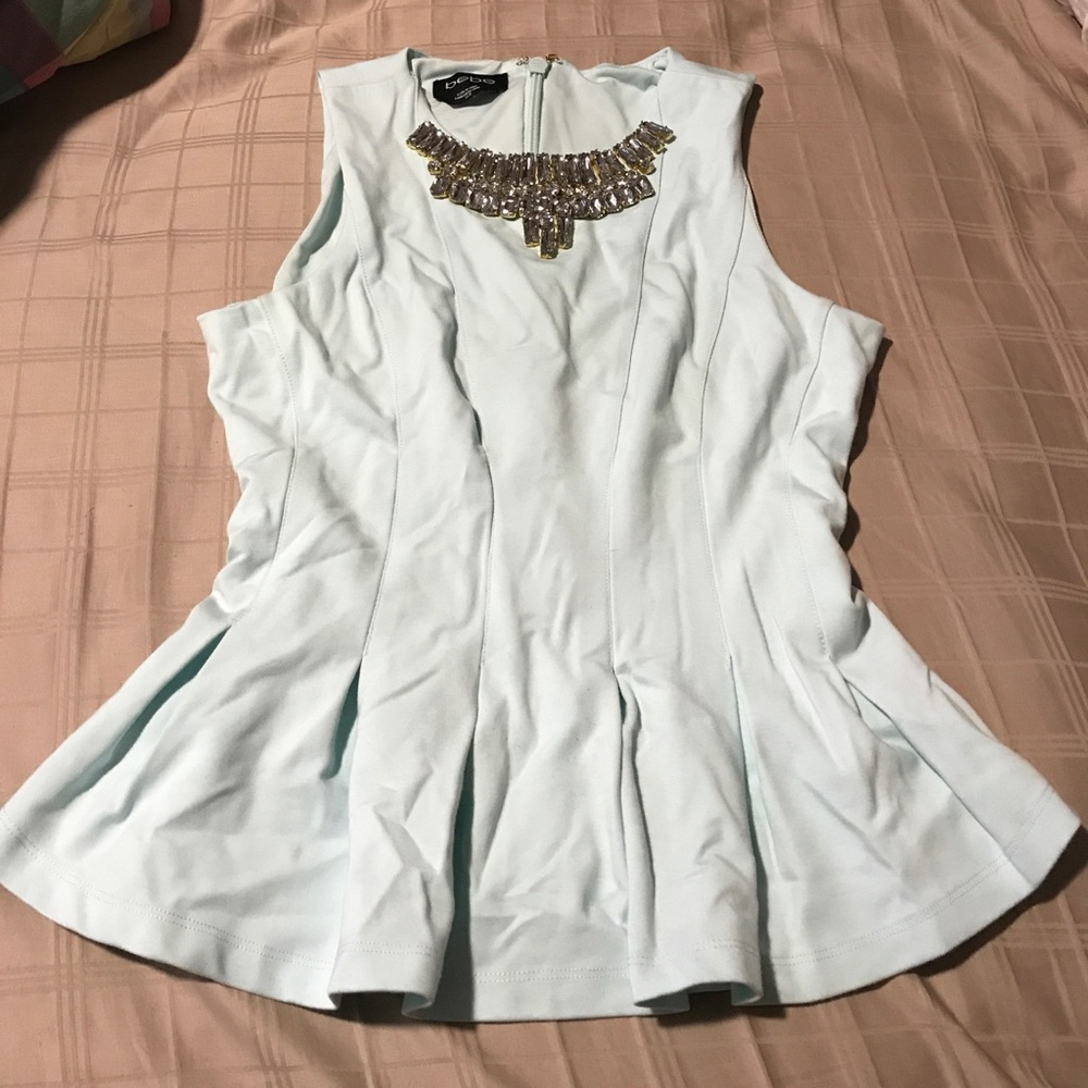 BeBe Peplum top.