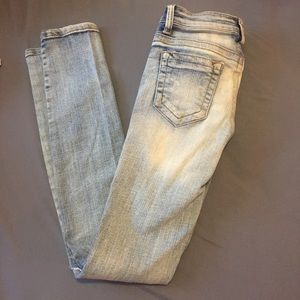 Size 5 distressed skinny jeans.