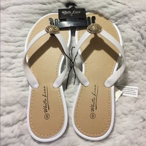 White Line rhinestone medallion sandals flip flops