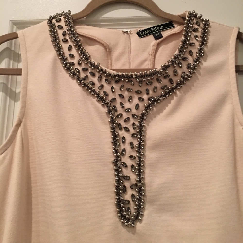Cream dress with silver and stone embellishing