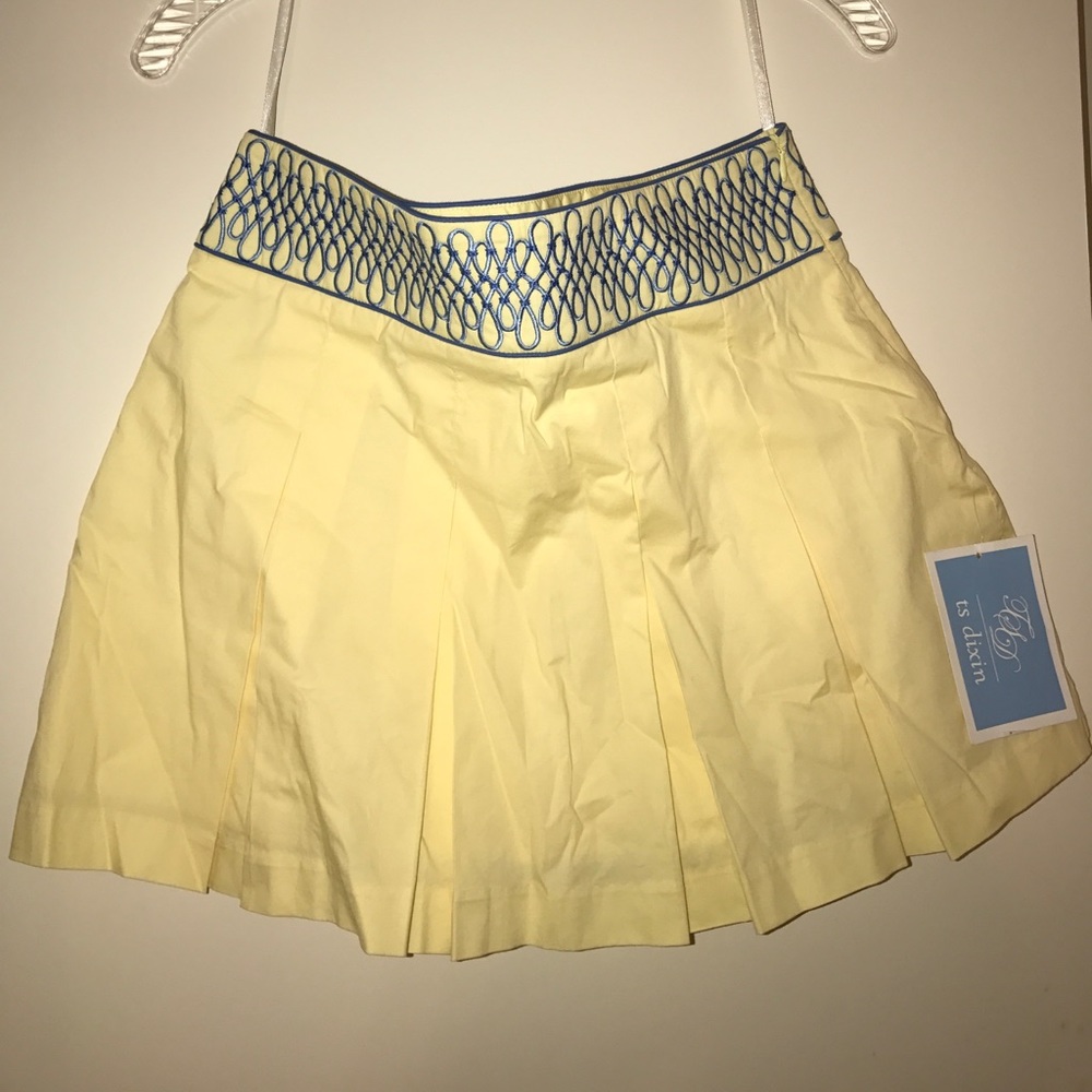 Cute Yellow ts dixin skirt! Size 4.
