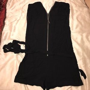 Black zip up Romper from Guess. Sz M