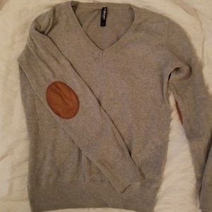 Gray sweater with suede elbow patches