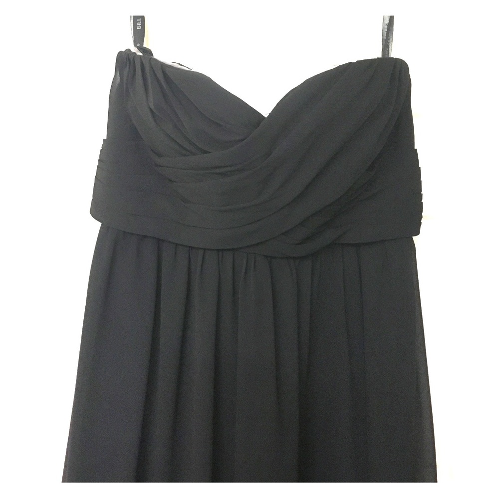 Black floor length dress.